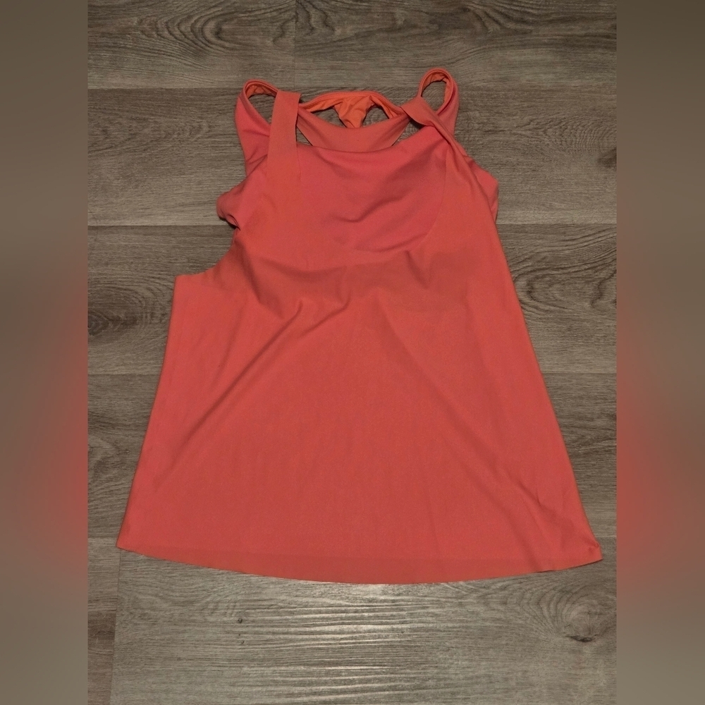 coral athletic tank top with a built-in bra.